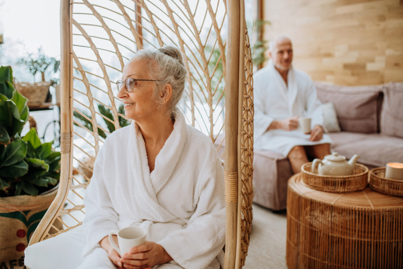 Elderly couple relaxing in spa robes. Elderly couple relaxing in spa robes.