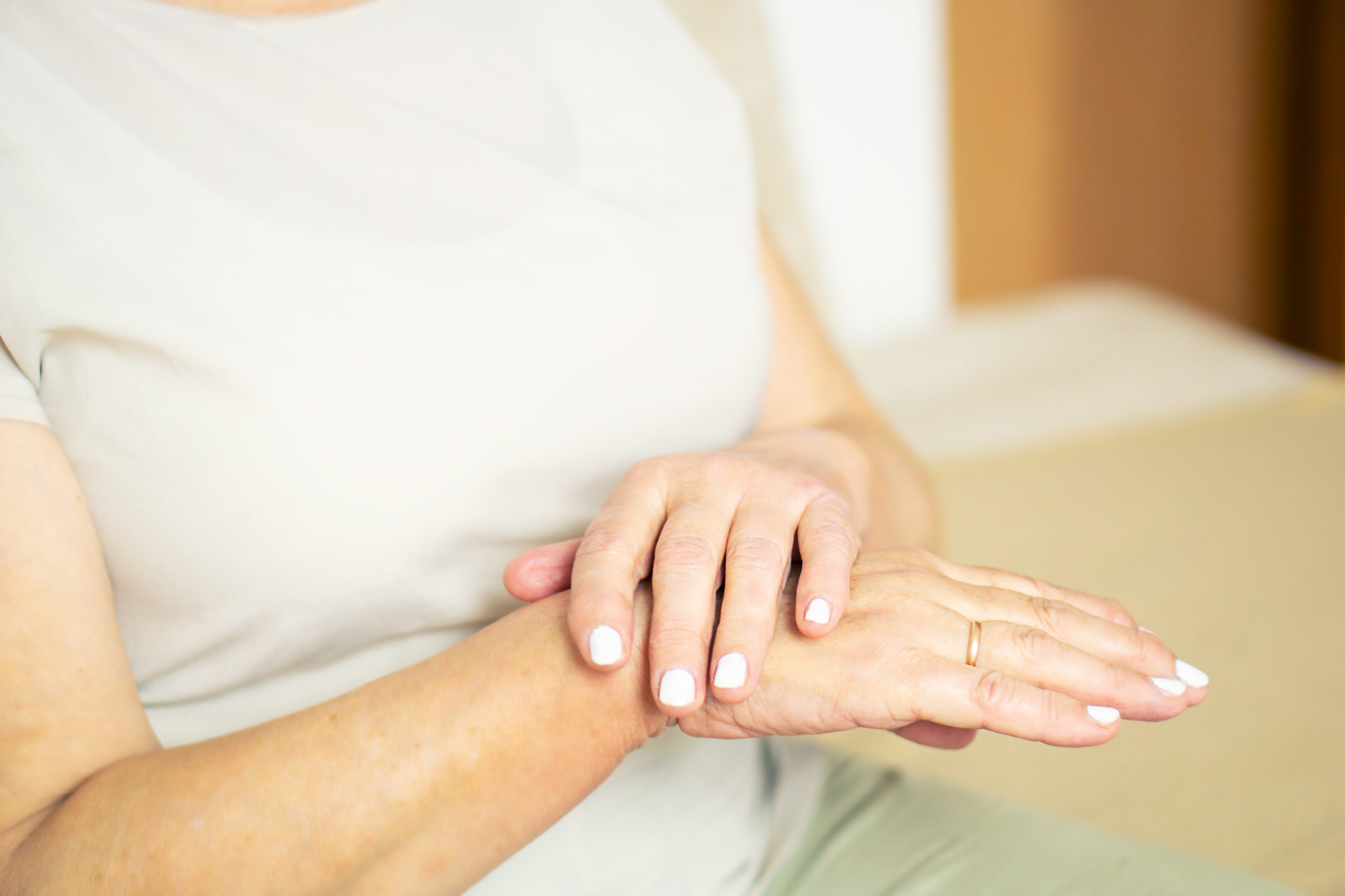 Close up senior woman with hand cream. Close up senior woman with hand cream.